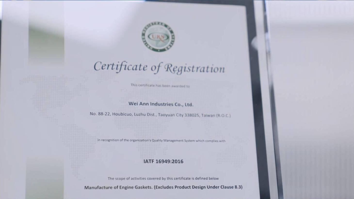Close-up view of a "Certificate of Registration" issued to Wei Ann Industries Co., Ltd., based in Taoyuan City, Taiwan, for their Quality Management System's compliance with IATF 16949:2016 standards in the manufacture of engine gaskets.